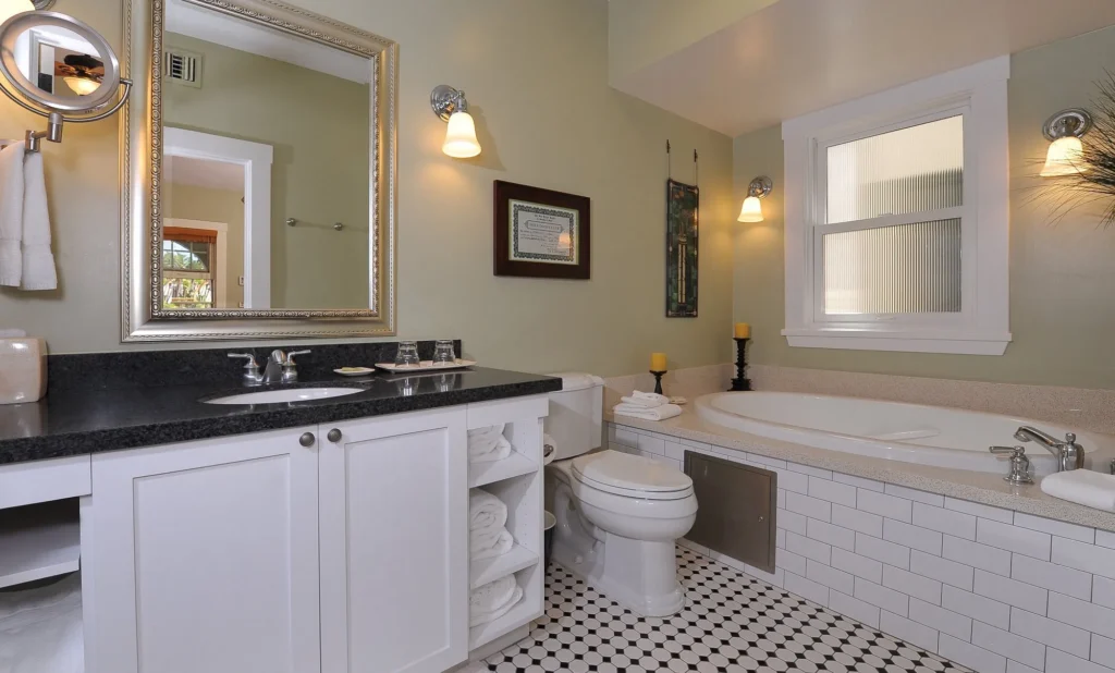 bathroom at 1906 Lodge in Coronado with an in-room jacuzzi tub, perfect for a peaceful California getaway